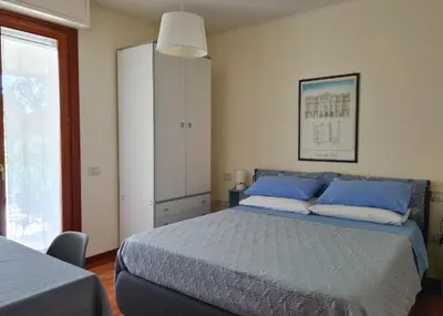 Letto o letti in una camera di CASA ORCHIDEA (Cod. IUN P9071)