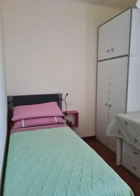 Letto o letti in una camera di CASA ORCHIDEA (Cod. IUN P9071)