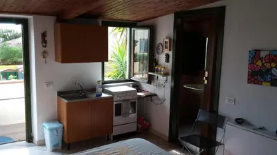 Cucina o angolo cottura di Panoramic Apartment with Terrace in Cagliari Heart U2019