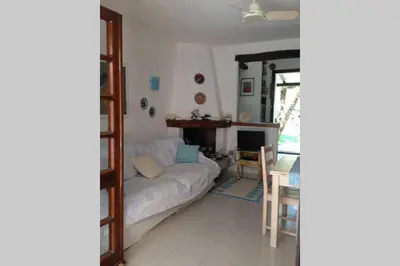 Letto o letti in una camera di VILLASIMIUS VILLA AND GARDEN, 10 MIN FROM BEACH