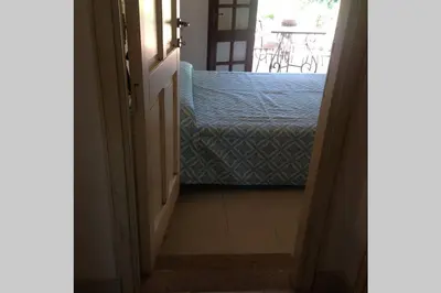 Letto o letti in una camera di VILLASIMIUS VILLA AND GARDEN, 10 MIN FROM BEACH