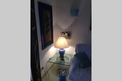 Letto o letti in una camera di VILLASIMIUS VILLA AND GARDEN, 10 MIN FROM BEACH