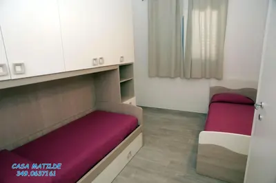 Letto o letti in una camera di Casa Matilde