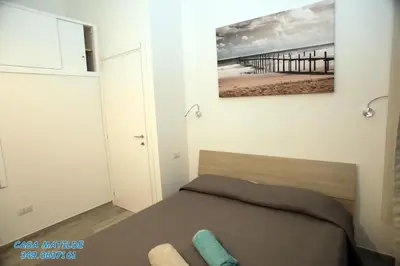 Letto o letti in una camera di Casa Matilde