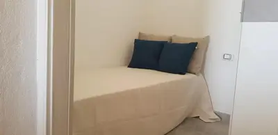 Letto o letti in una camera di Domus Claudia