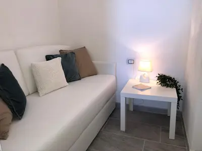 Letto o letti in una camera di Domus Claudia