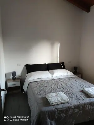Letto o letti in una camera di Casa di Roby 4L