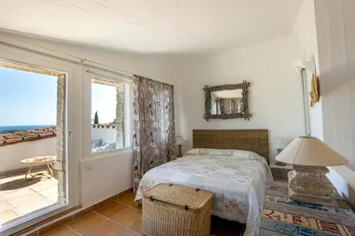 Letto o letti in una camera di BGItalianVacation - Ville Li Conchi