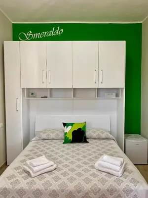 Letto o letti in una camera di Villa Francesca