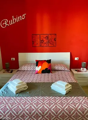 Letto o letti in una camera di Villa Francesca