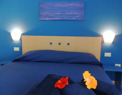 Letto o letti in una camera di Hotel Arcupintau formula B&B