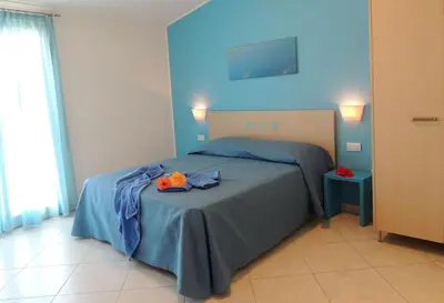 Letto o letti in una camera di Hotel Arcupintau formula B&B