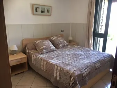 Letto o letti in una camera di Villa de la TORRE DI BARI SARDO