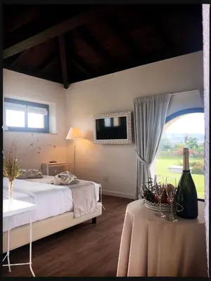 Letto o letti in una camera di Corte Maddalena Camere