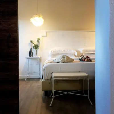 Letto o letti in una camera di Corte Maddalena Camere