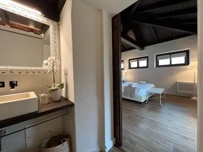 Letto o letti in una camera di Corte Maddalena Camere
