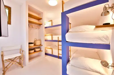 Letto o letti in una camera di LA PERLA DELL EDEN by KlabHouse