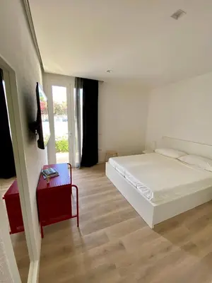 Letto o letti in una camera di Residenza Acqva di Mare