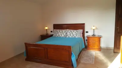 Letto o letti in una camera di Villa nel verde