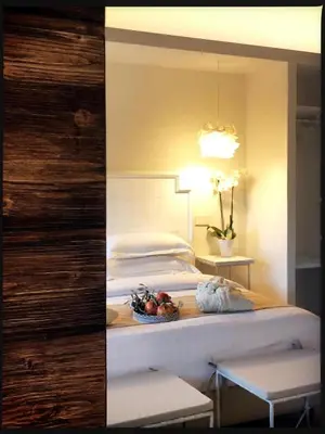 Letto o letti in una camera di Villa Corte Maddalena