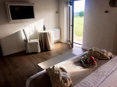 Letto o letti in una camera di Villa Corte Maddalena