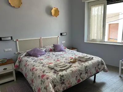 Letto o letti in una camera di B&B Babay
