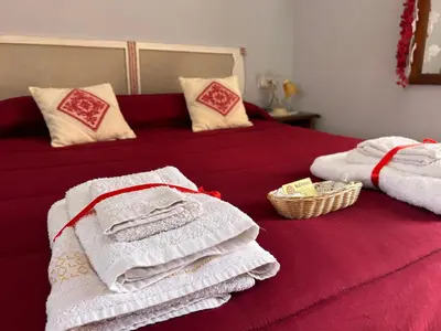 Letto o letti in una camera di B&B Babay