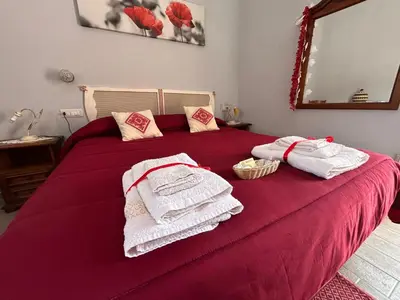 Letto o letti in una camera di B&B Babay
