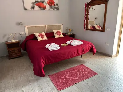 Letto o letti in una camera di B&B Babay