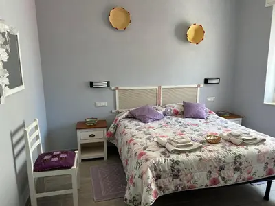 Letto o letti in una camera di B&B Babay