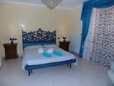 Letto o letti in una camera di Villa Graziosa
