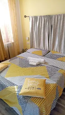 Letto o letti in una camera di B&B Sa Casadina