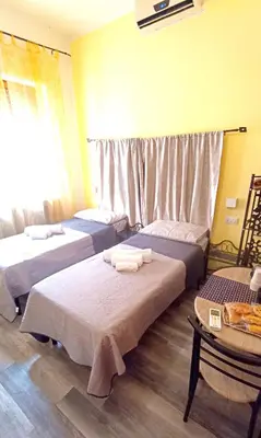 Letto o letti in una camera di B&B Sa Casadina