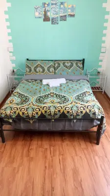 Letto o letti in una camera di B&B Sa Casadina
