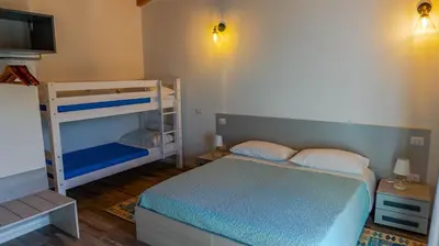 Letto o letti in una camera di B&B Montrabu