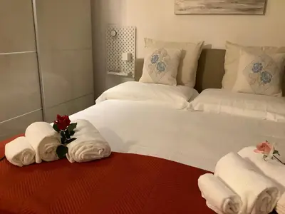 Letto o letti in una camera di Living Downtown Codice IUN Q4645