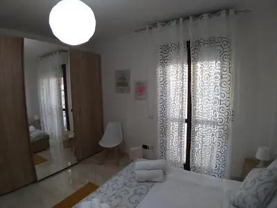 Letto o letti in una camera di Sophia' s house appartamento Quartello