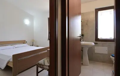 Letto o letti in una camera di Nice Apartment In Costa Rei -Ca- With Kitchenette