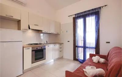 Cucina o angolo cottura di Cozy Apartment In Costa Rei -Ca-
