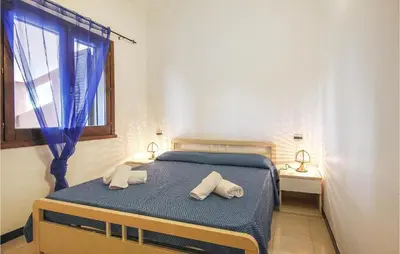 Letto o letti in una camera di Beautiful Apartment In Costa Rei -Ca-