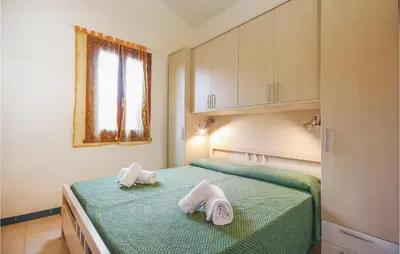 Letto o letti in una camera di Beautiful Apartment In Costa Rei -Ca-