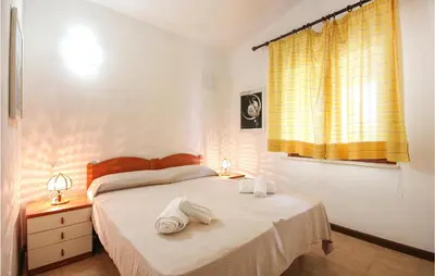 Letto o letti in una camera di Trilo Beach