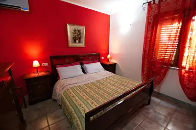 Letto o letti in una camera di Il Fenicottero