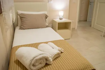 Letto o letti in una camera di Villa Giada