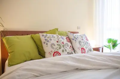 Letto o letti in una camera di DomoMea - Vespucci 4