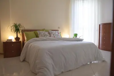 Letto o letti in una camera di DomoMea - Vespucci 4