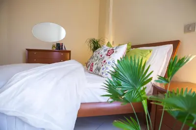 Letto o letti in una camera di DomoMea - Vespucci 4