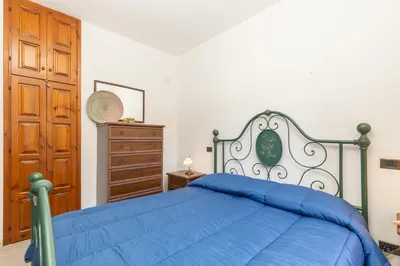 Letto o letti in una camera di Casa Raftin
