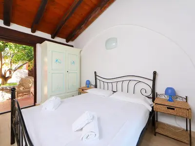 Letto o letti in una camera di Holiday Home Ville San Pietro - REI352 by Interhome
