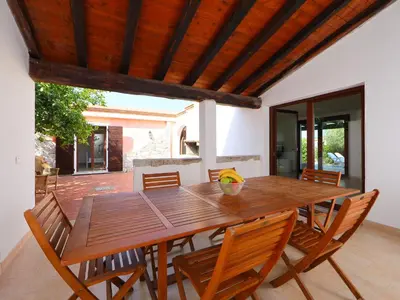 Patio o area all'aperto di Holiday Home Ville San Pietro - REI352 by Interhome